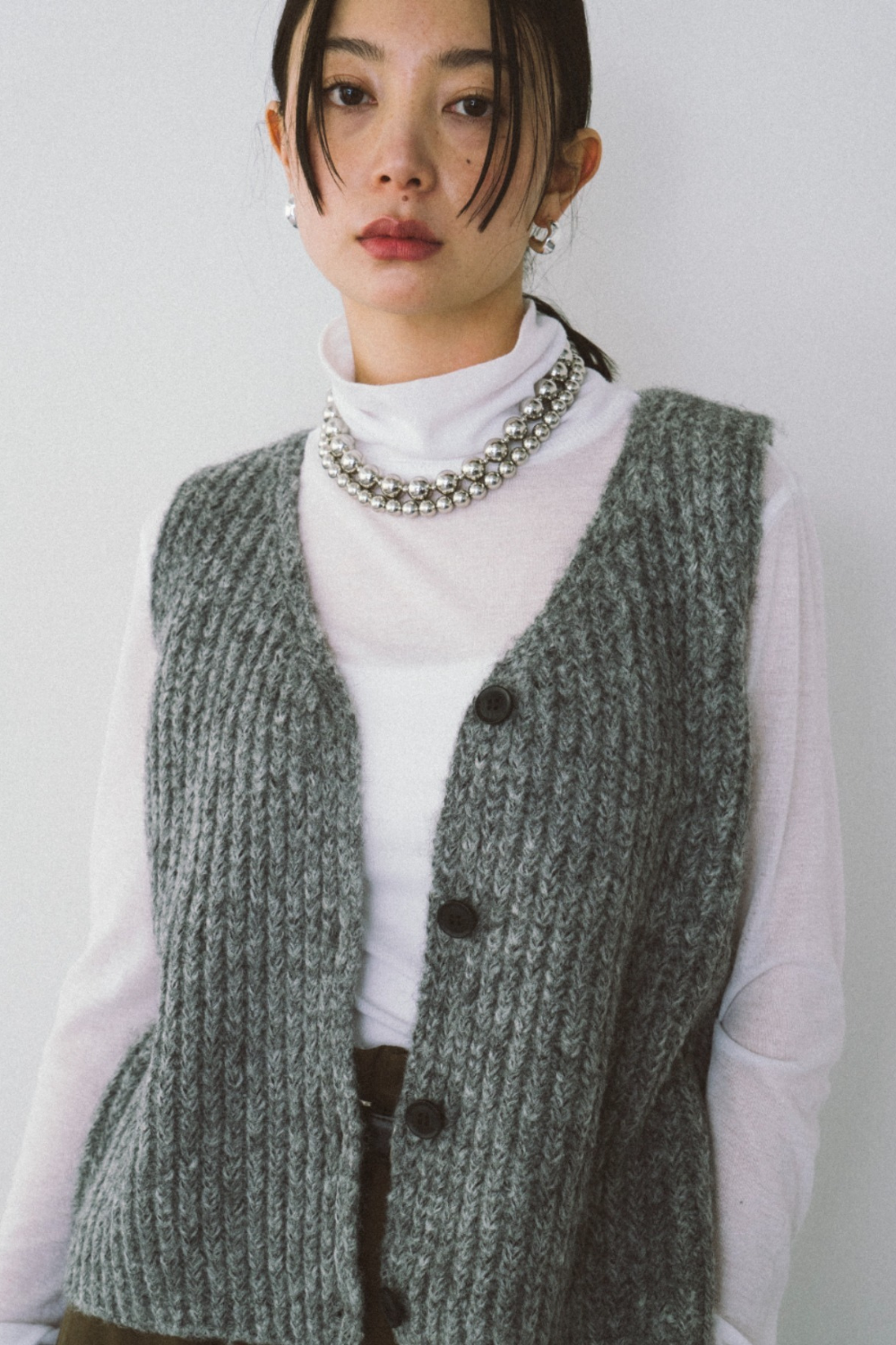 Front button knit vest