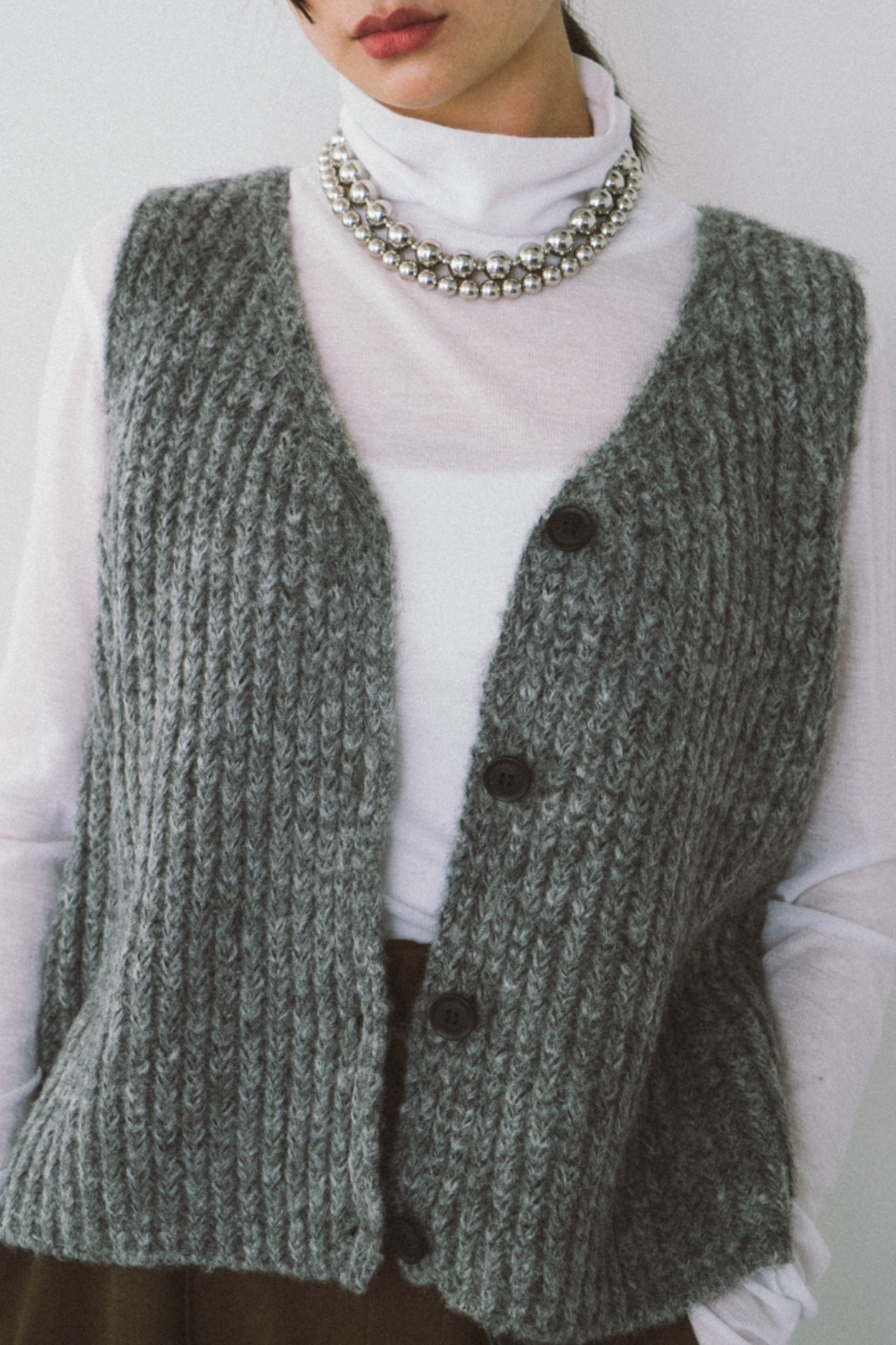 Front button knit vest