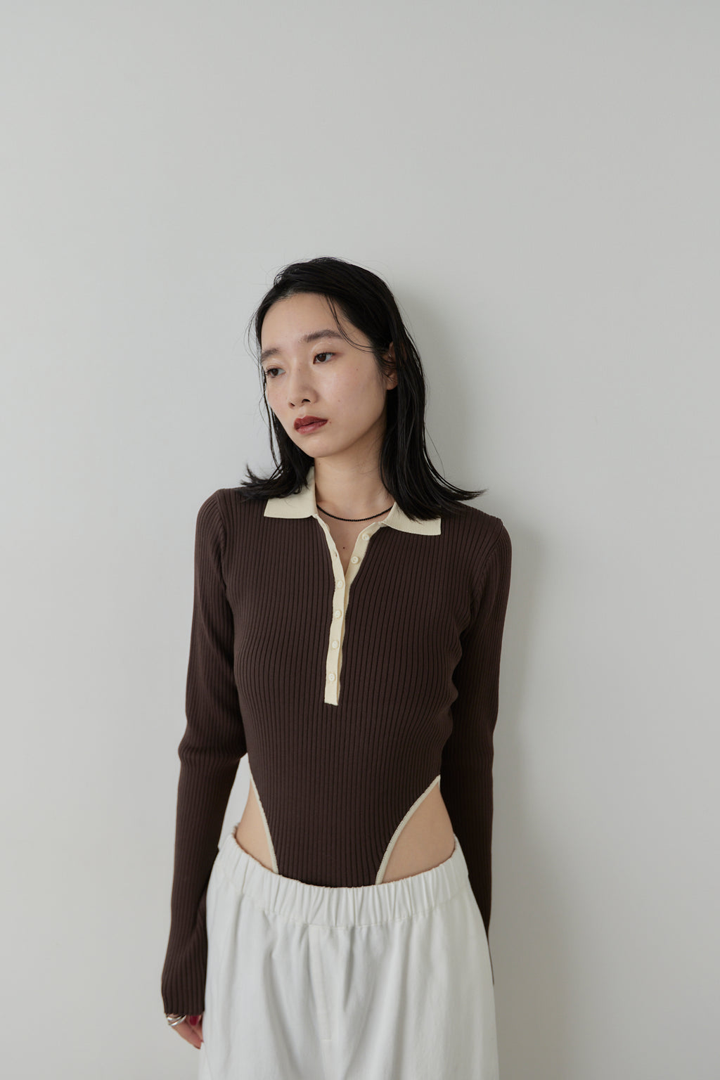 Poloknit bodysuit