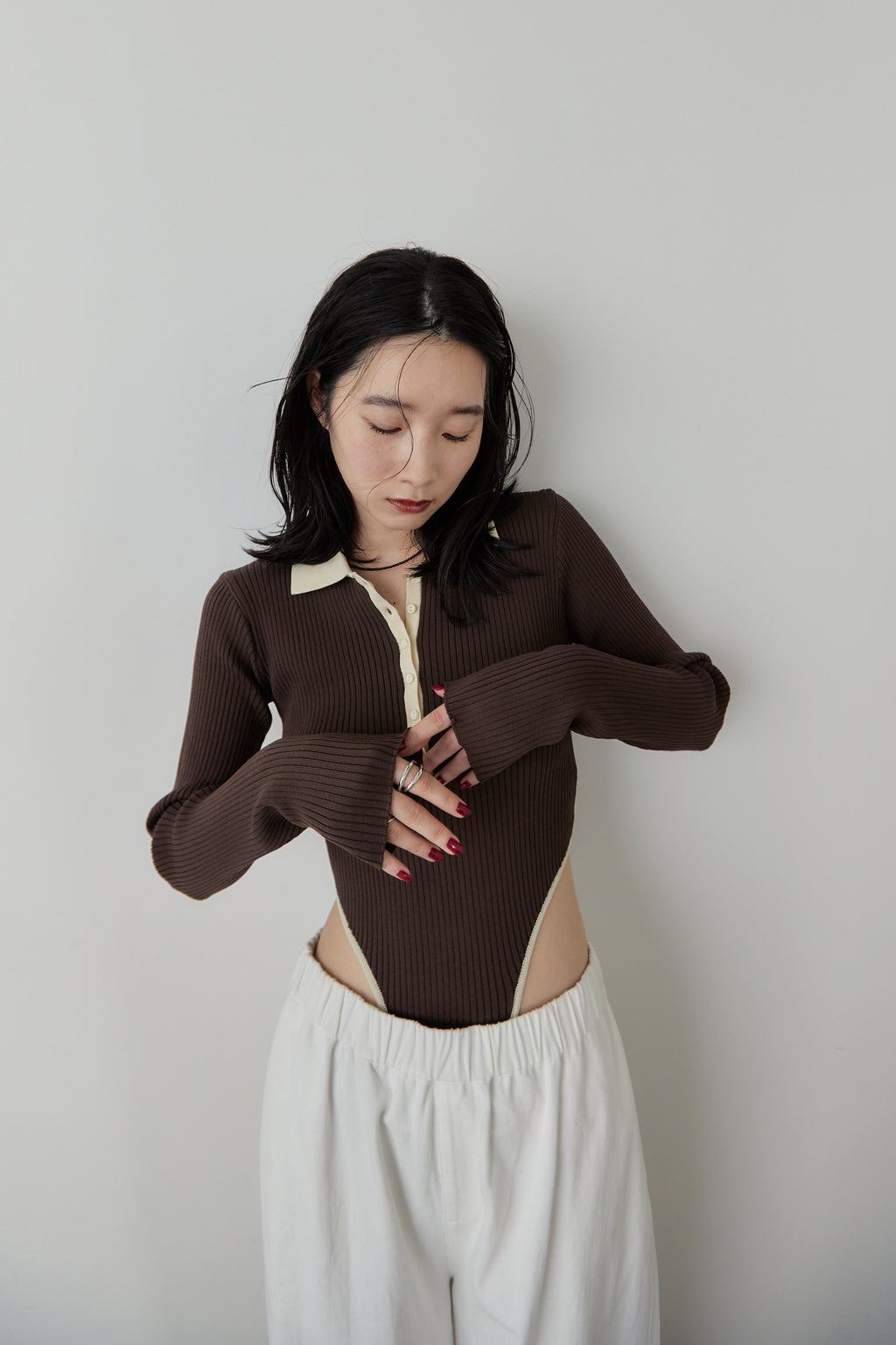 Poloknit bodysuit