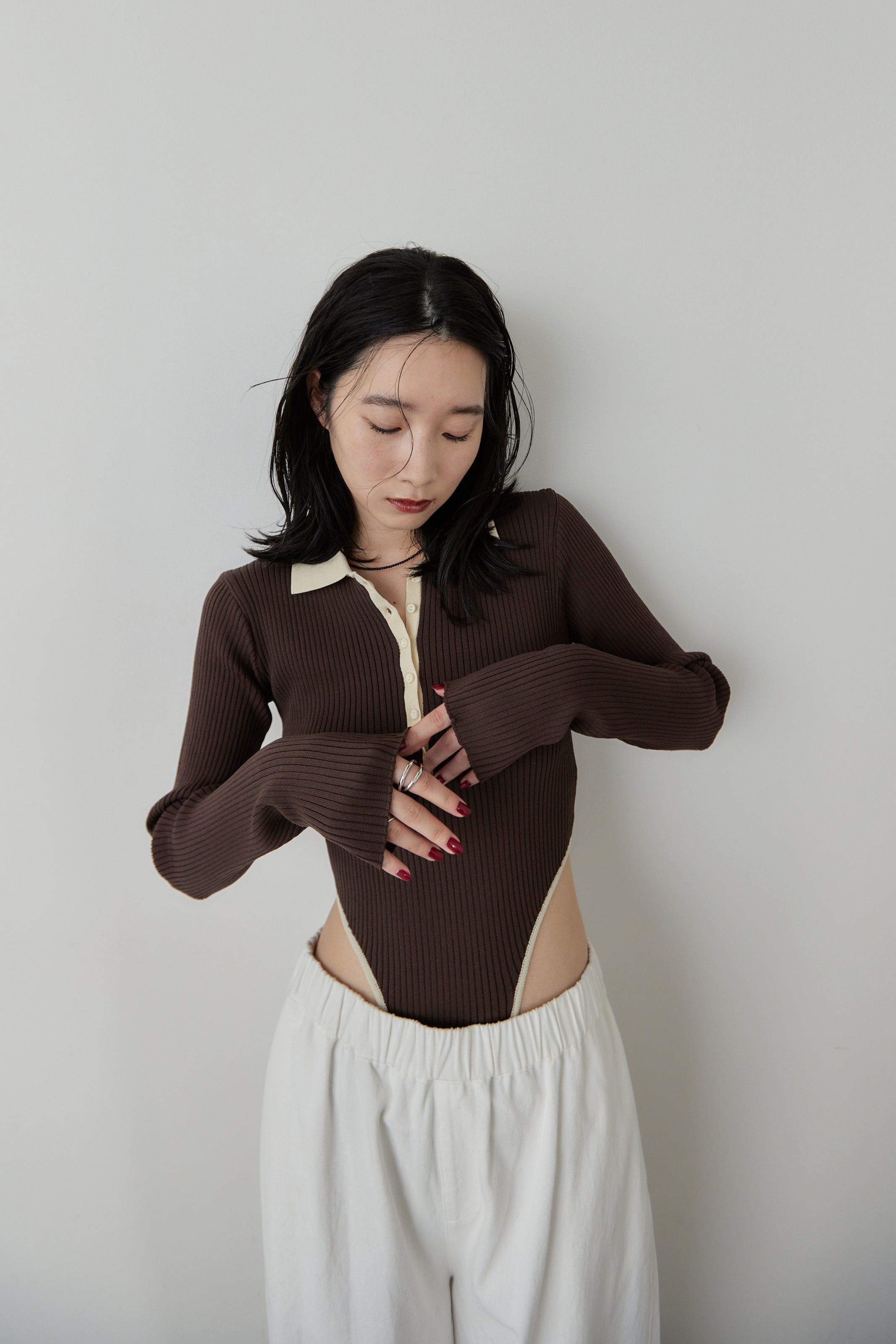 Poloknit bodysuit