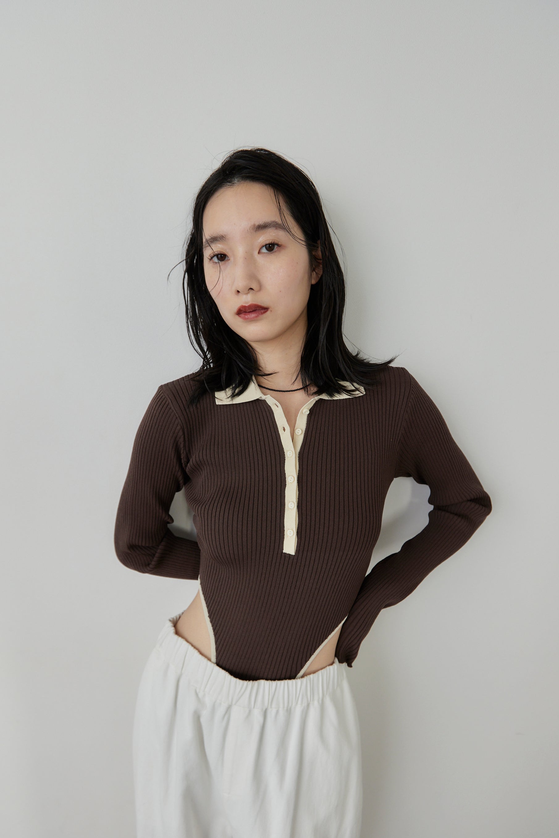 Poloknit bodysuit