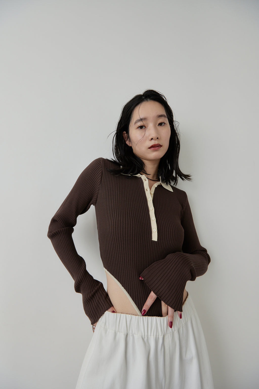 Poloknit bodysuit