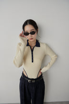 Poloknit bodysuit