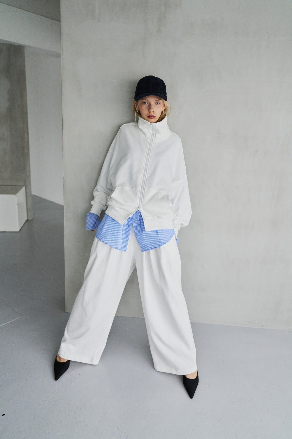 Tucked wide sweatpants