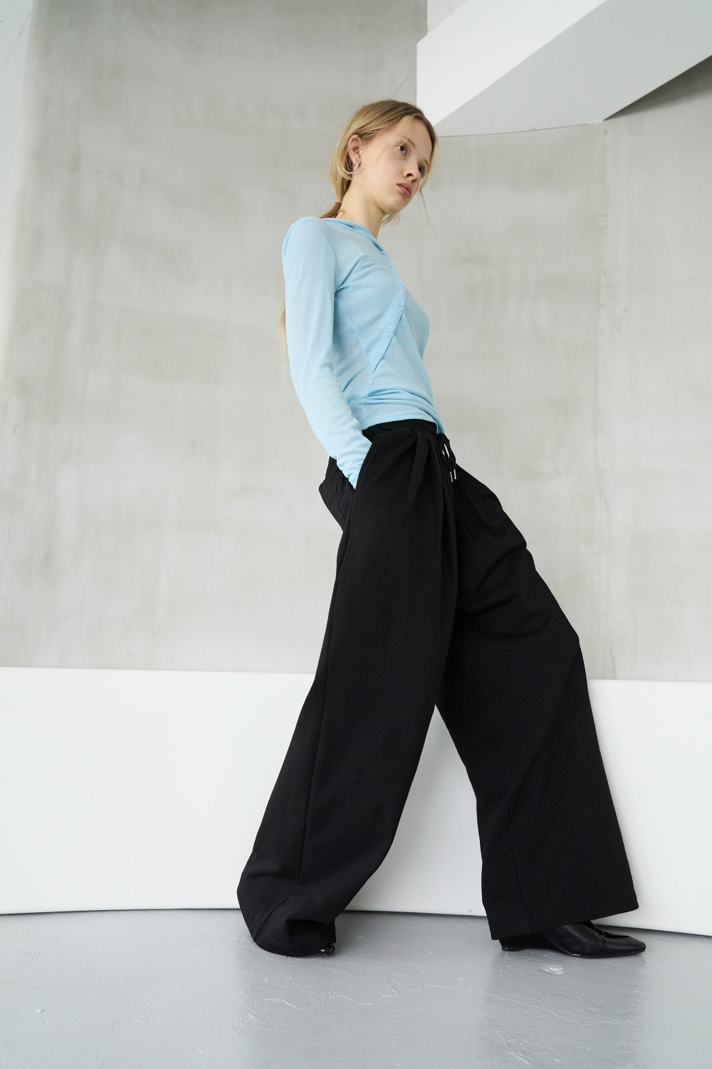 Tucked wide sweatpants