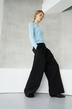 Tucked wide sweatpants