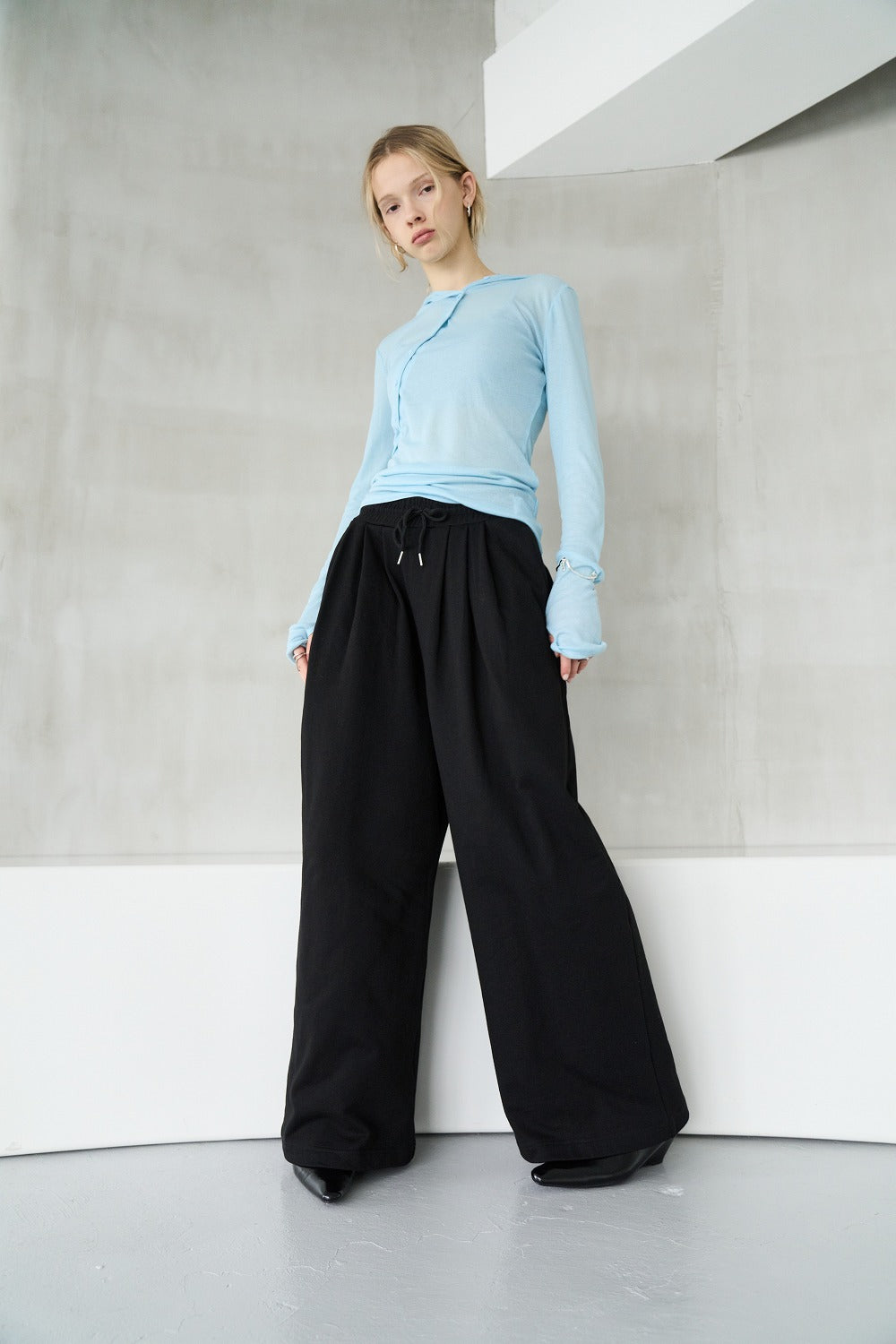 Tucked wide sweatpants