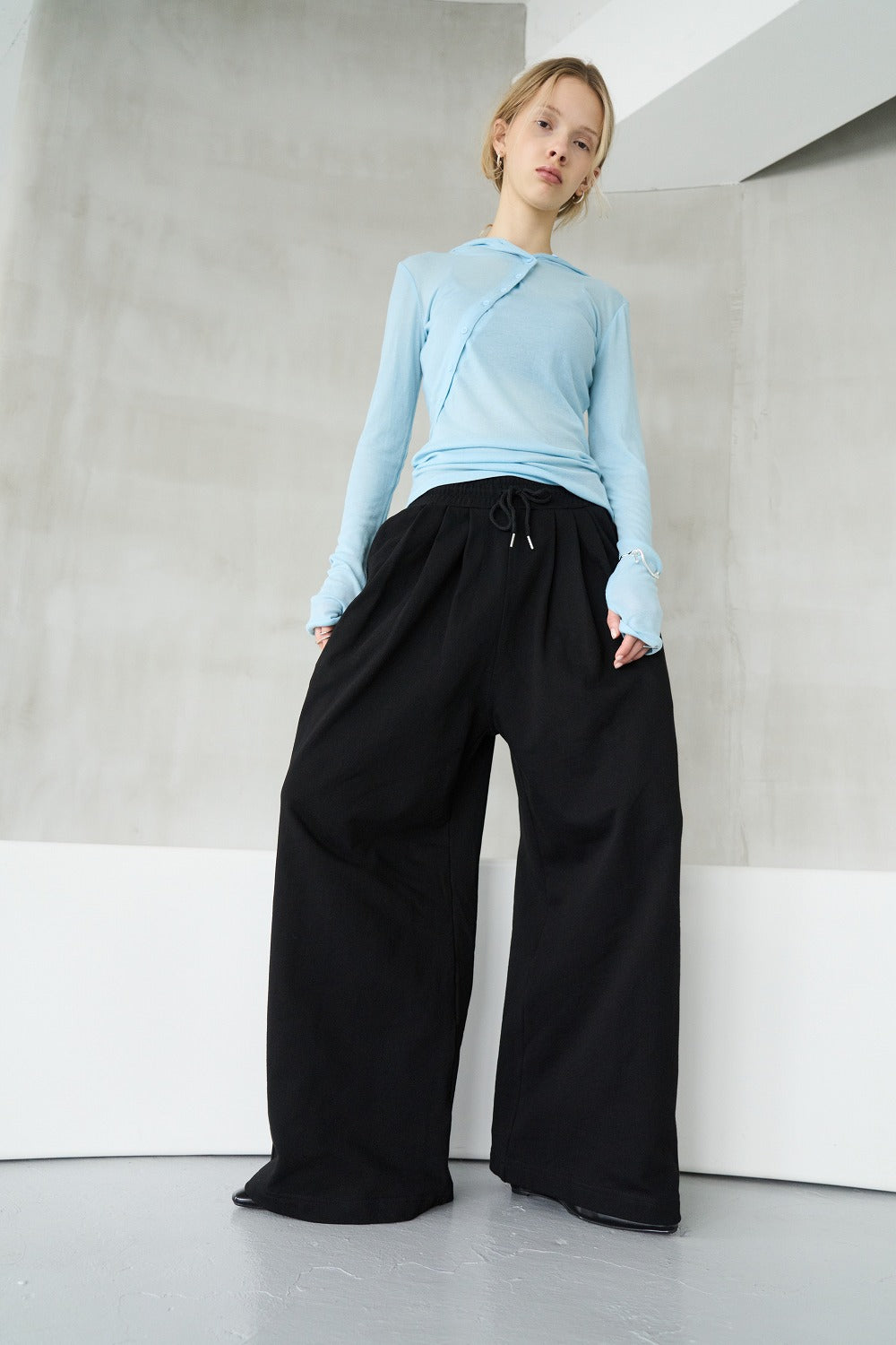Tucked wide sweatpants