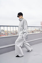 Tucked wide sweatpants