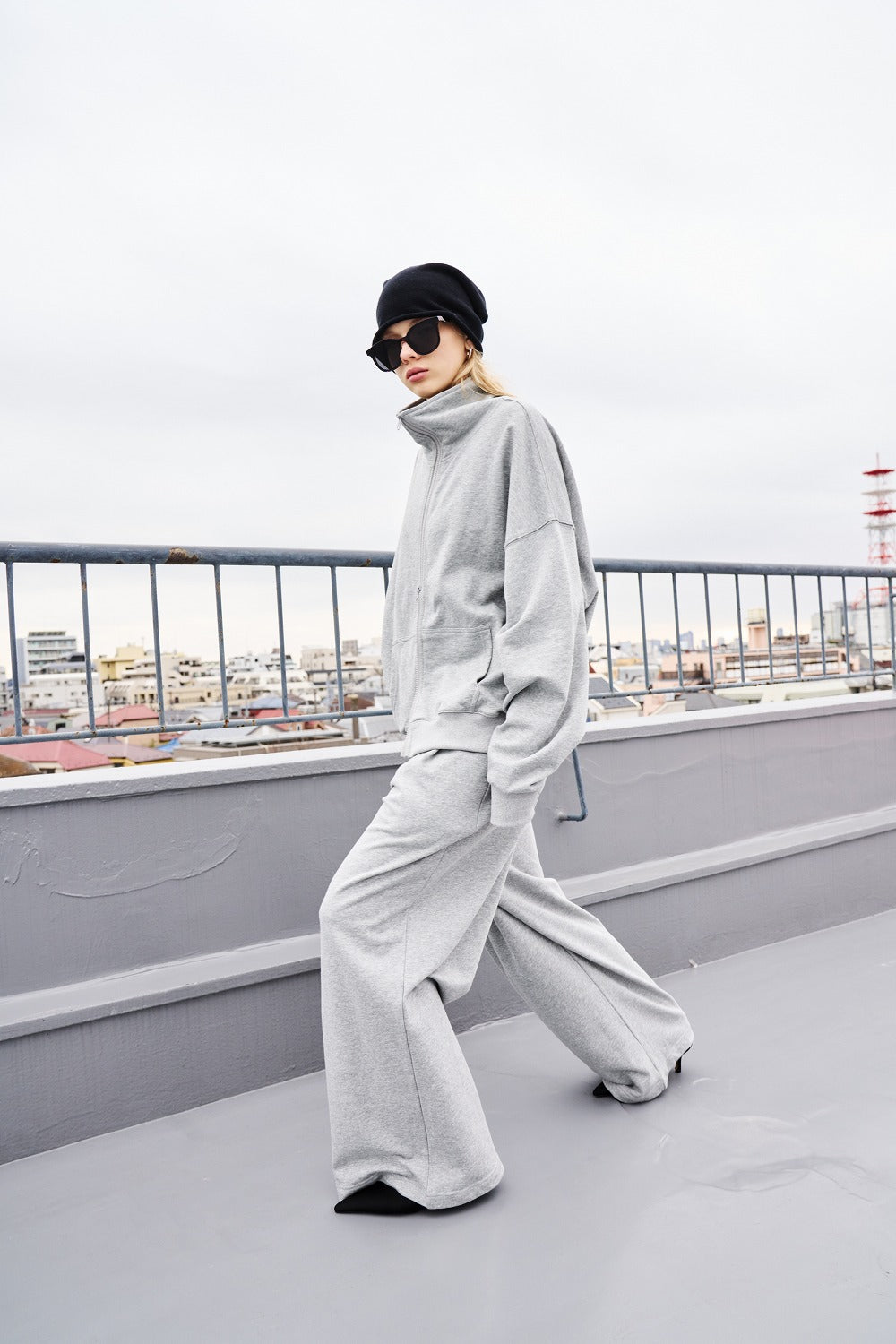 Tucked wide sweatpants