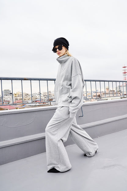 Tucked wide sweatpants