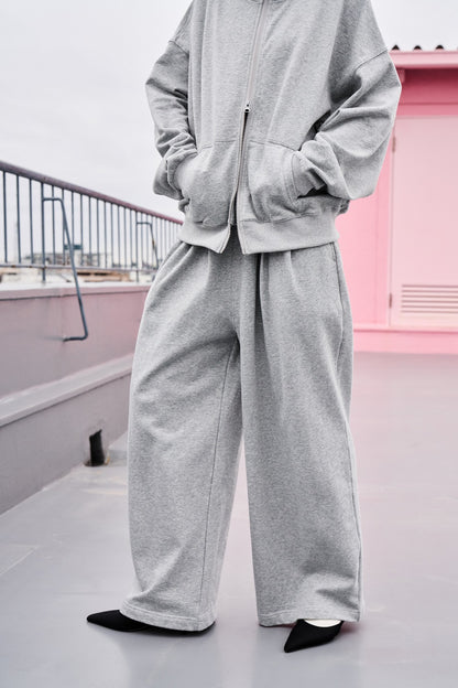 Tucked wide sweatpants