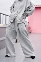 Tucked wide sweatpants