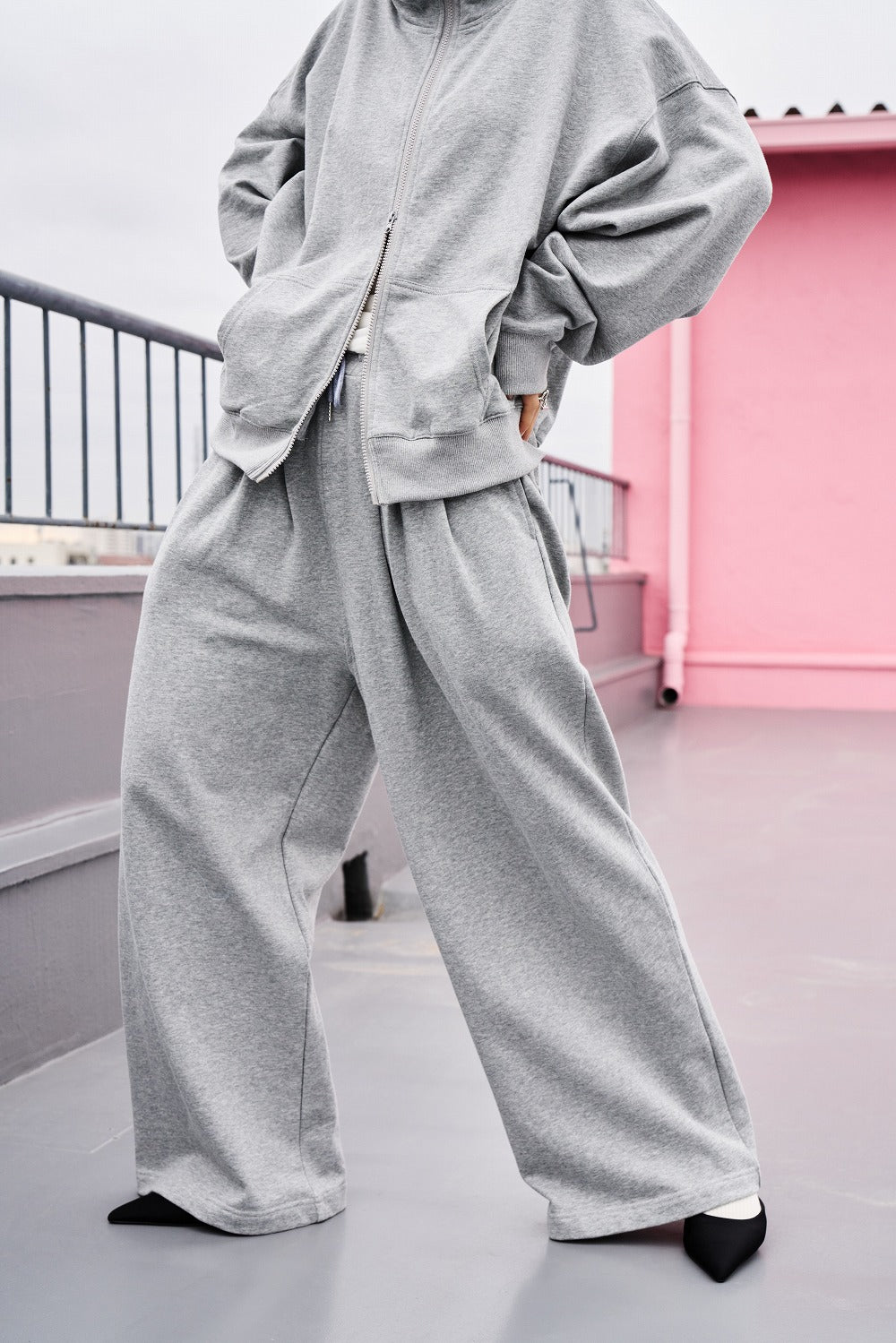 Tucked wide sweatpants