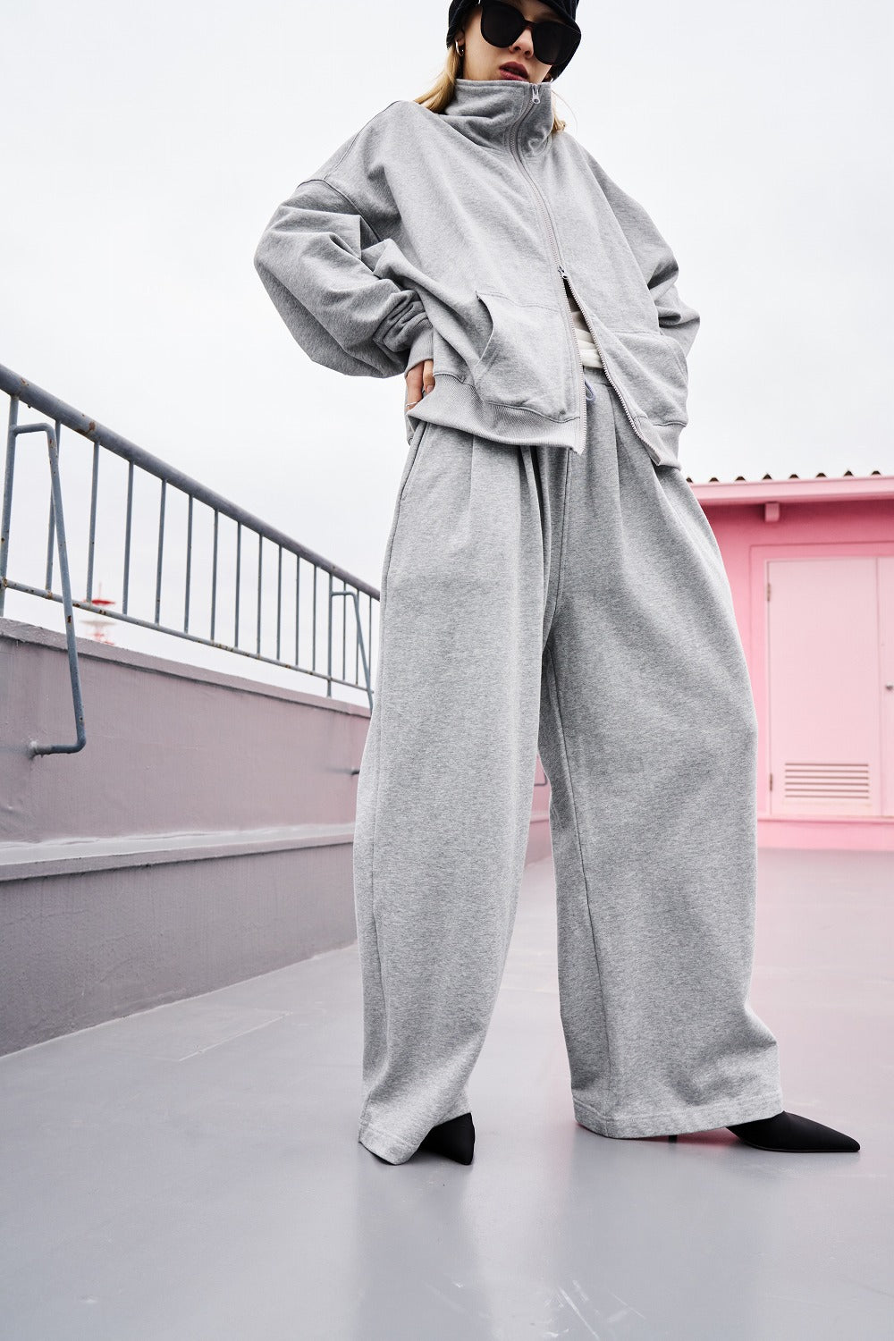 Tucked wide sweatpants