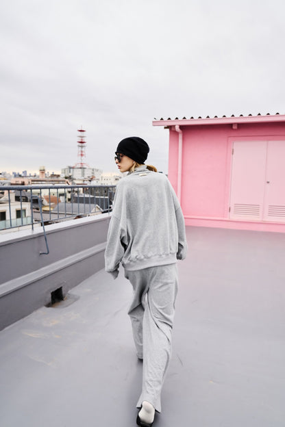 Tucked wide sweatpants