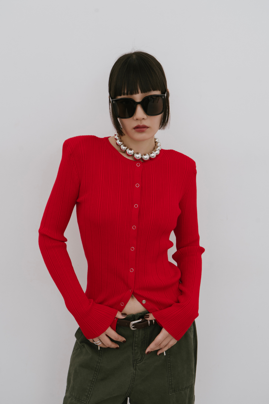 Power shoulder snap button knit
