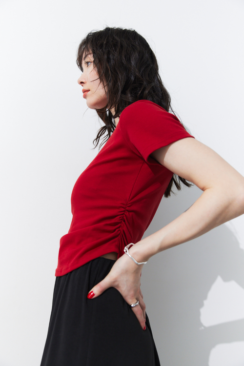 Side gather compact TEE