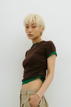 Side gather compact TEE