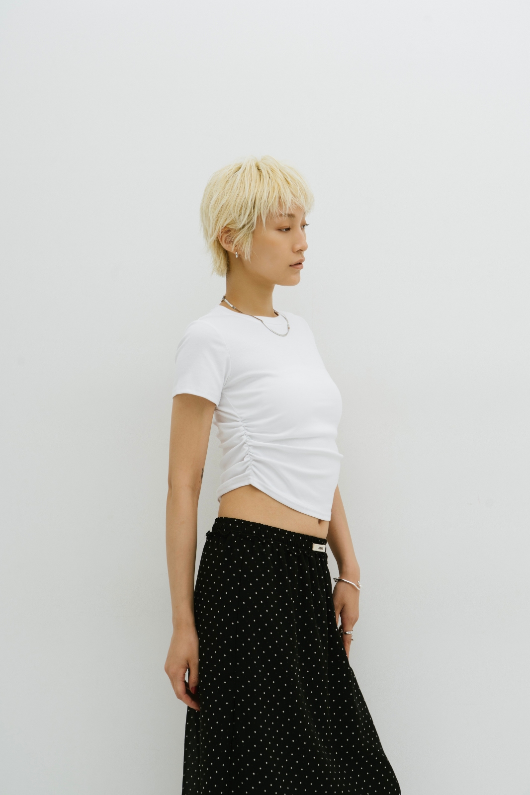 Side gather compact TEE