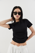 Side gather compact TEE