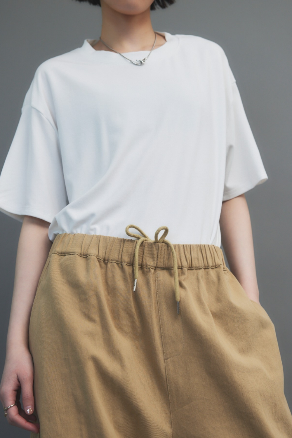 Cotton roll-up curved pants