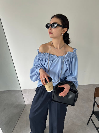 Ruched off-shoulder blouse