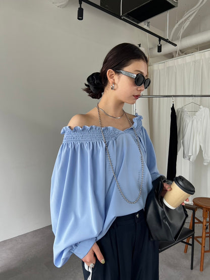 Ruched off-shoulder blouse