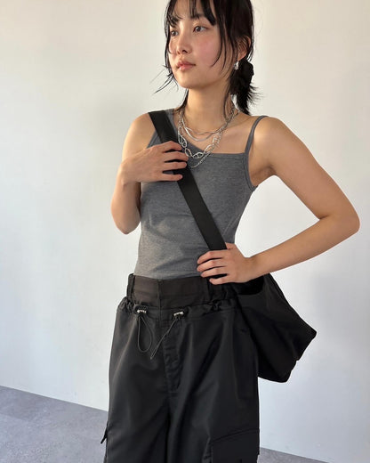 Cup-in asymmetric tank